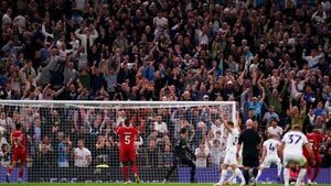 Tottenham claim dramatic last-gasp victory over nine-man Liverpool