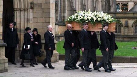 Manchester and wider football world say final goodbyes to Sir Bobby Charlton