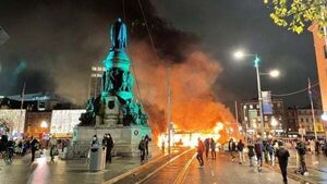 Dublin riots: Bus and Luas burnt, shops looted, as 400 gardaí face 'lunatic faction'