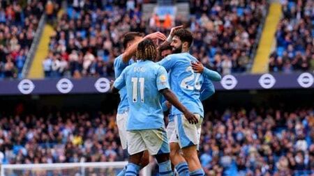 Five-star Manchester City blow away Luton to return to the Premier League summit