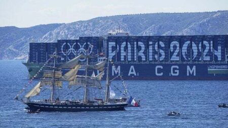 Ship carrying Olympic torch arrives in Marseille amid fanfare and high security