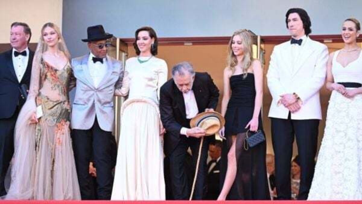 Francis Ford Coppola salutes the crowd at world premiere of Megalopolis