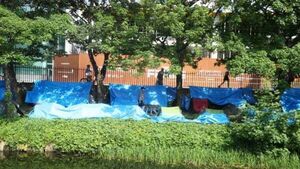 Tent clearance underway along Grand Canal in Dublin Tent clearance underway along Grand Canal in Dublin