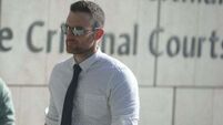 Garda to face trial charged with burglary, perverting course of justice and false imprisonment