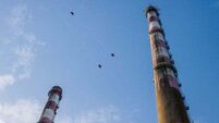 ESB raises 'serious safety incident' with regulator after skydivers fly through Poolbeg chimneys