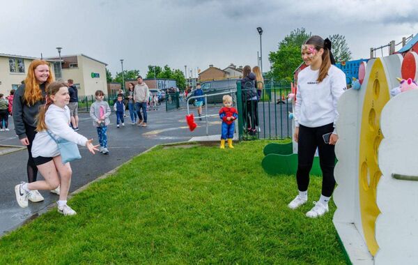 Issy Rea looks on as Caitlin Dwyer try her hand at the bean bag toss, also looking on is Áine Malone. Photo: michaelorourkephotography.ie Issy Rea looks on as Caitlin Dwyer try her hand at the bean bag toss, also looking on is Áine Malone. Photo: michaelorourkephotography.ie