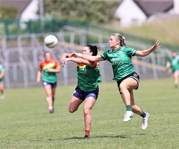 Ruth Bermingham the Carlow captain and Brendan Bannon from Fermanagh compete for the ball in NCP on Sunday. Photo: Pat Ahern