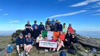 Coláiste Eoin teachers hike Lugnaquilla to raise money for Éist cancer support 