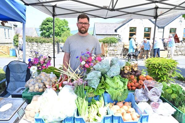 Peter Lee with his fresh vegetables on display at Rathanna Village Day
