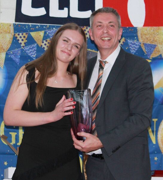 A Spirit of the School Award is presented to Vicky Van Tonder by Mr Hutton A Spirit of the School Award is presented to Vicky Van Tonder by Mr Hutton