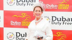 Trusty white suit ensures Liz is crowned best dressed at Irish Derby Trusty white suit ensures Liz is crowned best dressed at Irish Derby