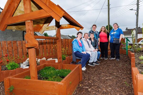 The sisters and niece of Anthony Wilson in Tullow Men’s Shed Diversity Garden: Ann Cloke, Sadie and Linda Wilson, Nora Monaghan, Eileen Kinsella, and Annie Monaghan