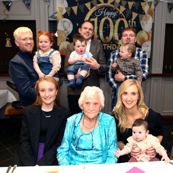 Angela with her grandchildren and great grandchildren. Photo by: Joe Guinan 