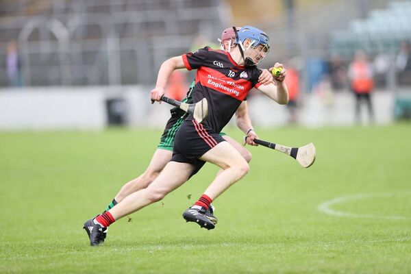 Jamie Nolan from MLR tries to break through the Bagenalstown Gaels defence.