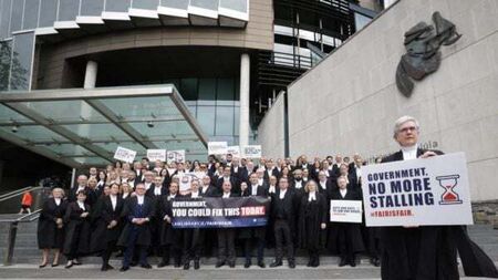 Government urged to engage with criminal law barristers as fresh protests held