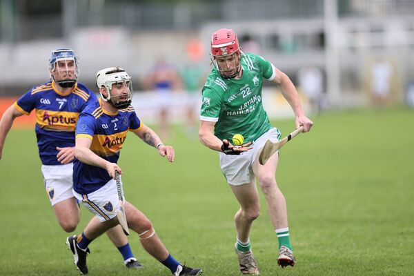 Oisin Ryan tries to get past Ballinkillen's Ciarán Dowling in the SHC on Saturday.