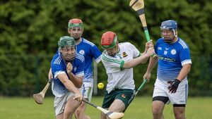 Burren survive late comeback to keep 100% record