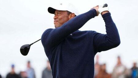 Struggling Tiger Woods set to miss Open cut as Shane Lowry moves into lead