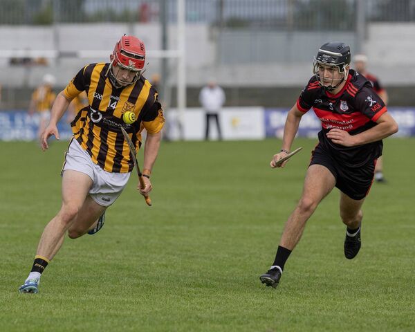 Naomh Eoin's Colm Beck and Mount Leinster Rangers Michael Joyce. Photo: Thomas Nolan Photography.