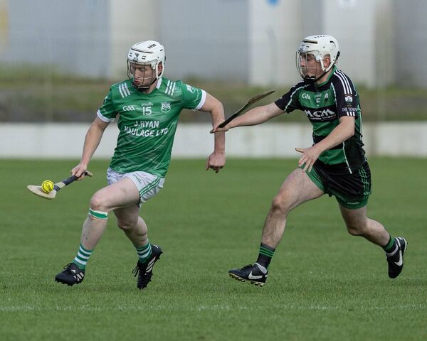 Naomh Moling's Jason O'Neill and Bagenalstown Gaels Eoghan Dowling. Photo: Thomas Nolan Photography.