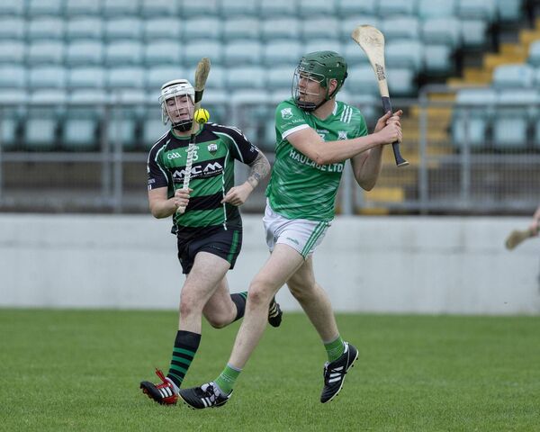 Naomh Moling's Paidi O'Shea and Bagenalstown Gaels Keelan Guidera. Photo: Thomas Nolan Photography.
