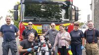 Brave firefighters tackle dirty cars for Cian 