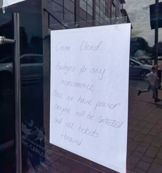 The hand-written sign on the front of the cinema