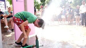 Olympic athletes and fans struggle to stay cool as Paris temperatures soar