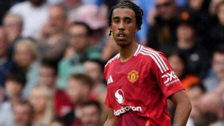 Manchester United defender Leny Yoro seen on crutches with left foot injury