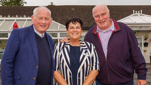 Fr John Dunphy with staff members from Doyle's of the Shamrock and Topline 