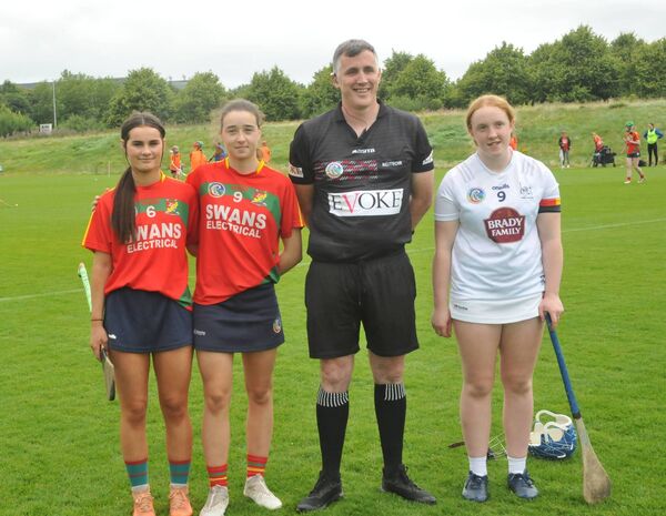 Carlow joint captains Sarah Murphy and Alice Dalton with the match referee and Kildare captain before the U16B All-Ireland semi-final Photo: Martin Rowe Carlow joint captains Sarah Murphy and Alice Dalton with the match referee and Kildare captain before the U16B All-Ireland semi-final Photo: Martin Rowe