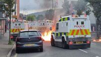 Business and cars set on fire as fresh violence breaks out in Belfast