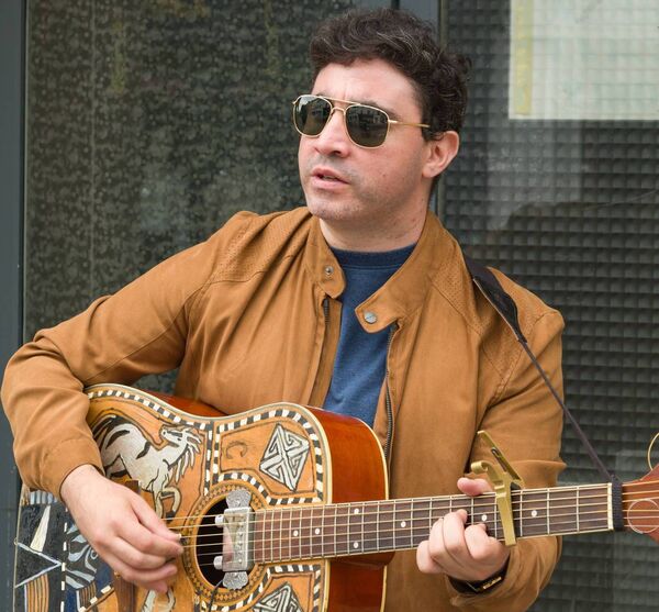 Daniel Craig, winner of the busking competition Photos: Luke Wynne
