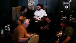 Robbie Henshaw joins in for a trad session at Wexford pub at the Fleadh Cheoil