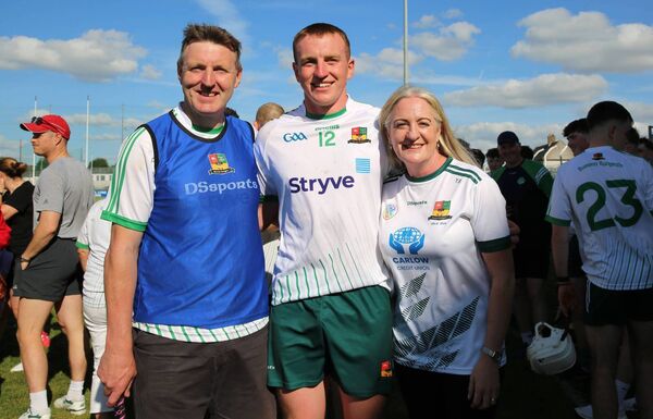 Jarlath Bolger the Burren Rangers manager and trainer celebrates their JHC victory in the county final with his son Conor and wife Yvonne Photo: Pat Ahern Jarlath Bolger the Burren Rangers manager and trainer celebrates their JHC victory in the county final with his son Conor and wife Yvonne Photo: Pat Ahern