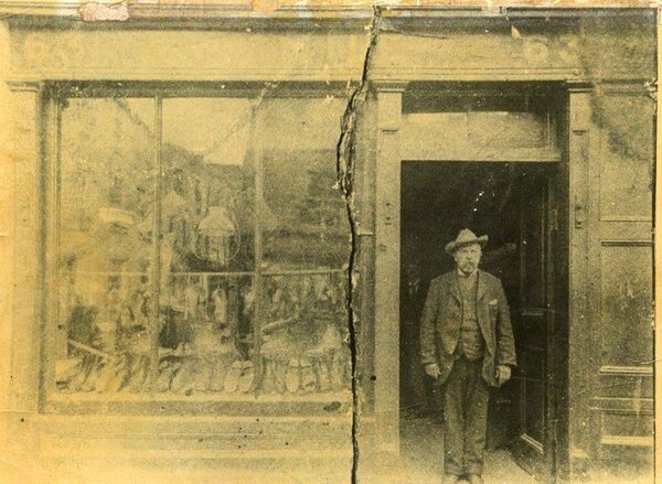 Luke Wynne outside his bootmaker's shop