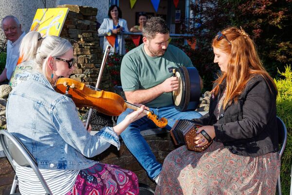 Traditional musicians Lisa De Buitléir, Hugsy and Megan McDonald performing at the launch of Carlow Culture Night 2024 