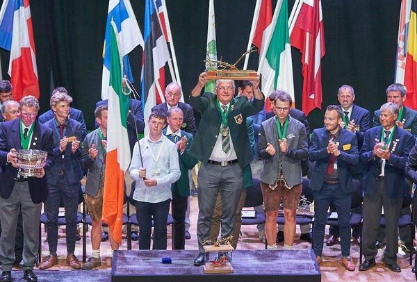 Eamonn on the winners' podium with the World Ploughing trophy Eamonn on the winners' podium with the World Ploughing trophy