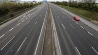 Motorist drove 'erratically' in front of funeral before trying to ram gardaí on M50, court told