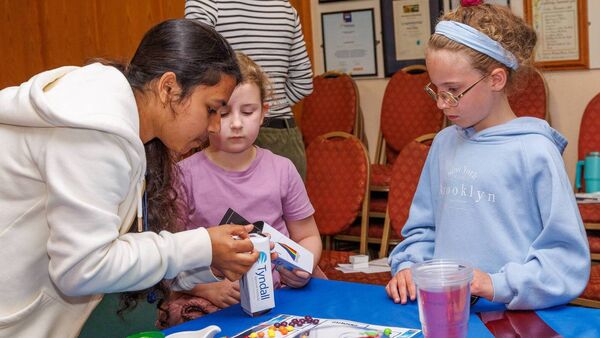 Tyndall National Institute's Tilottoma Saha helps Alannah Redmond and Ciara Brennan build a colour spectrum Tyndall National Institute's Tilottoma Saha helps Alannah Redmond and Ciara Brennan build a colour spectrum