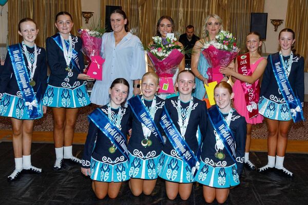 The U12s present flowers to their mentors Lisa Murray, Amey Bermingham and Emily Kirwan