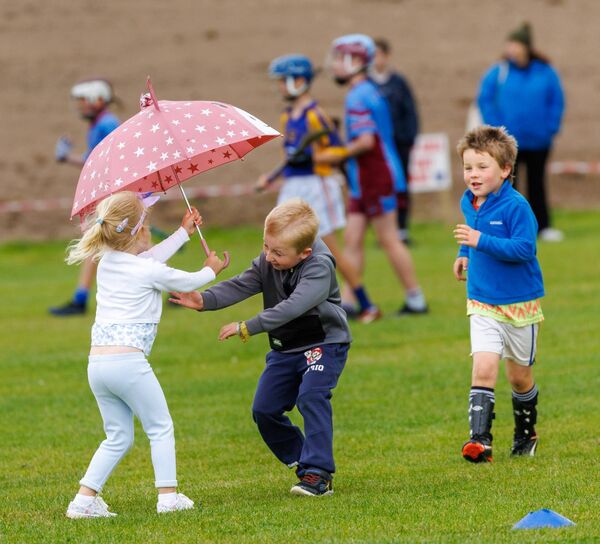 Mollie Gleeson, Jamie Huff and Joe Kelly have fun at the Teammate's Forever Challenge in remembrance of Eoghan &amp; Ruari Chada at Ballikillen Hurling Club. Photos: michaelorourkephotography.ie