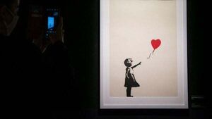 Two charged with burglary after Banksy painting stolen from London gallery