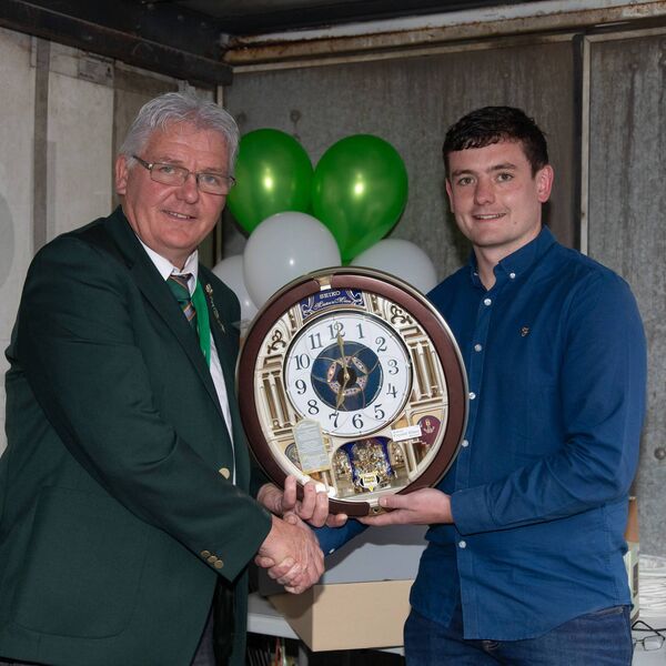 Eamonn Tracey 2024 World ploughing champion receiving a presentation from Steve Tracey (Carlow Ploughing Chairman
