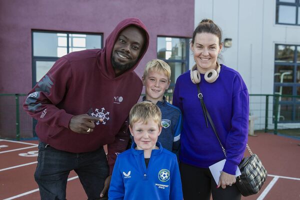 The McDonald family with Olympic bronze medalist, Rasheed Broadbell The McDonald family with Olympic bronze medalist, Rasheed Broadbell