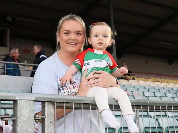 Lisa Nolan holds Kilbride supporter Charley Ryan before the throw in of the JFC 'A' semi final Photo: Pat Ahern