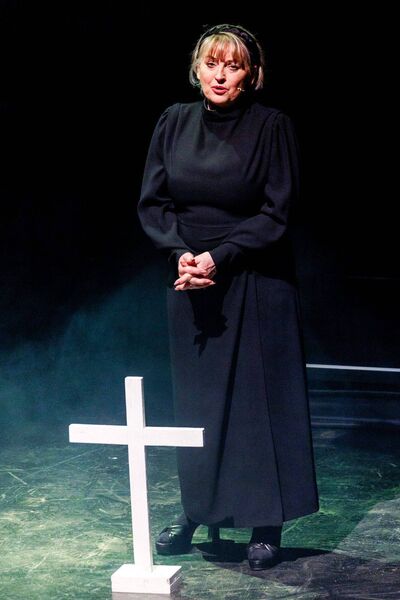 Rebecca Storm as Frau Breitner performs the opening song during Letters from the Front in the George Bernard Shaw Theatre