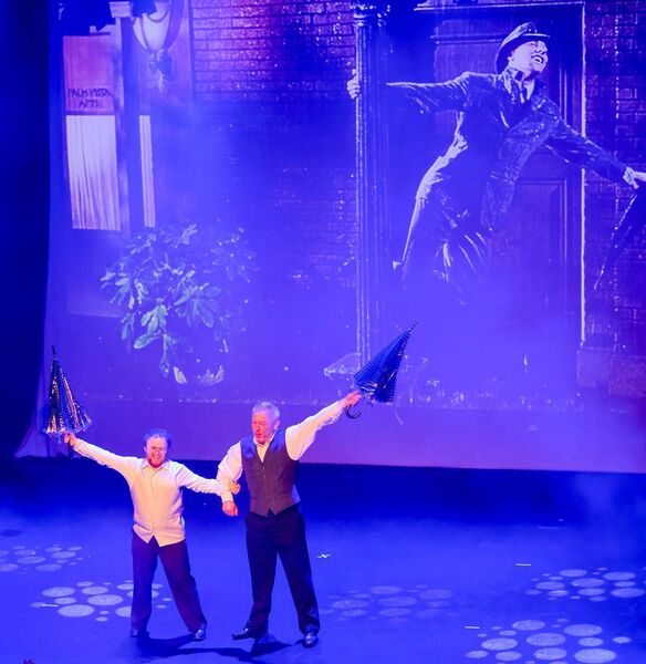 Pat Olwill and his son Barry perform "Singing in the Rain" during the Delta Centre's presentation of "A Class Act" in the George Bernard Shaw Theatre in Carlow