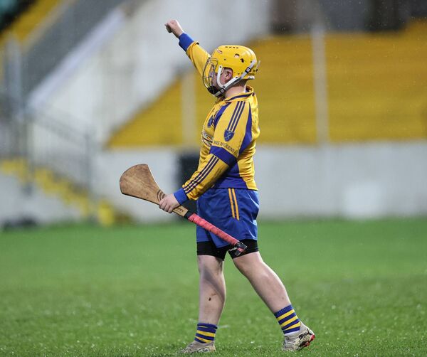 Ballinkillen goalkeeper Jason Slater salutes his team scoring a goal at the other end of the field Photo: Pat Ahern