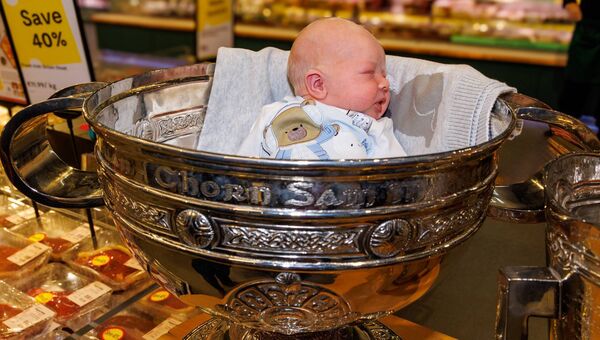 One week old Max Arthurs the son of Stephen Arthurs takes a nap in the the Sam Maguire Cup during the official opening One week old Max Arthurs the son of Stephen Arthurs takes a nap in the the Sam Maguire Cup during the official opening